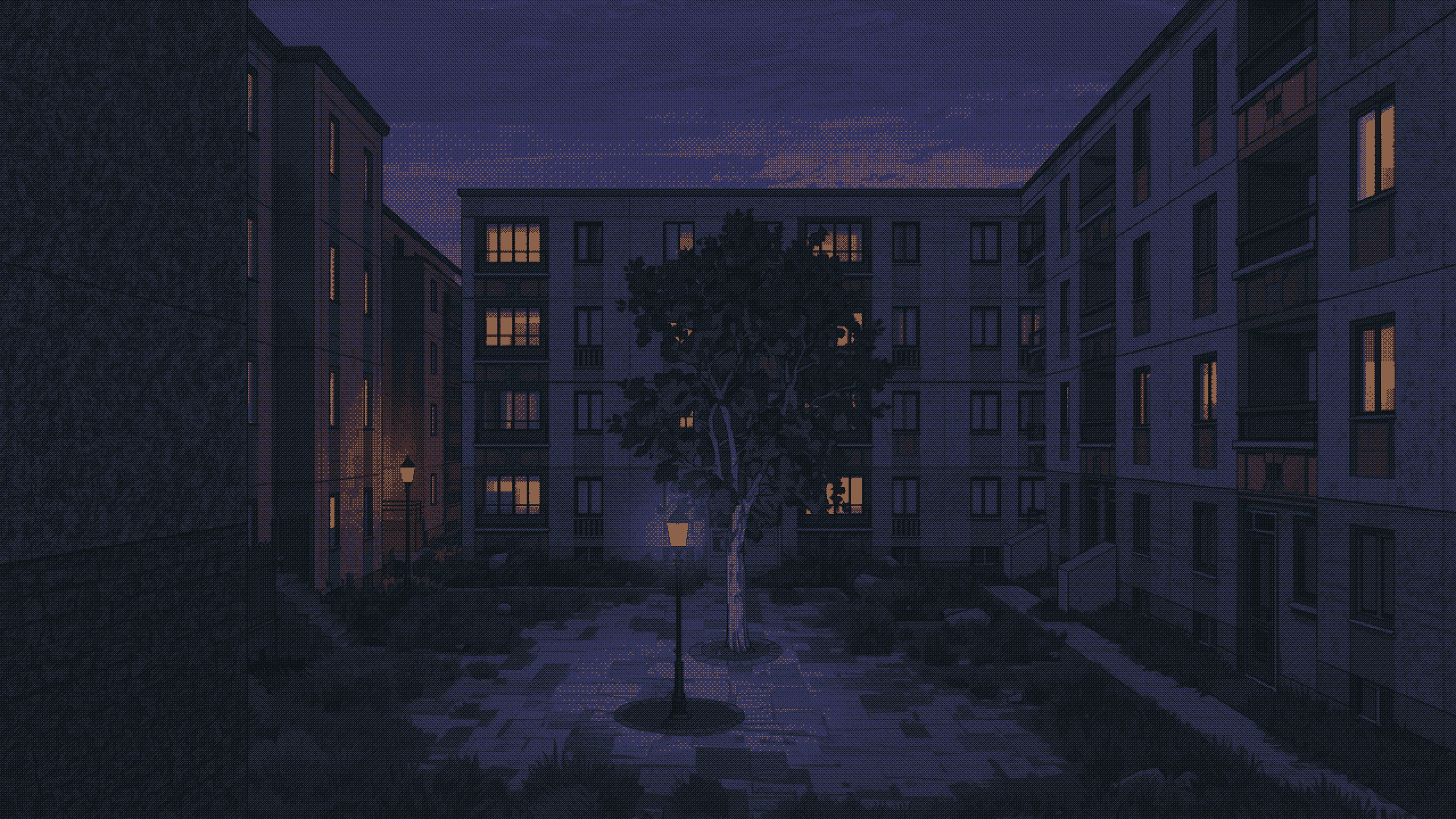 The courtyard of an old apartment block at night, a few windows lit