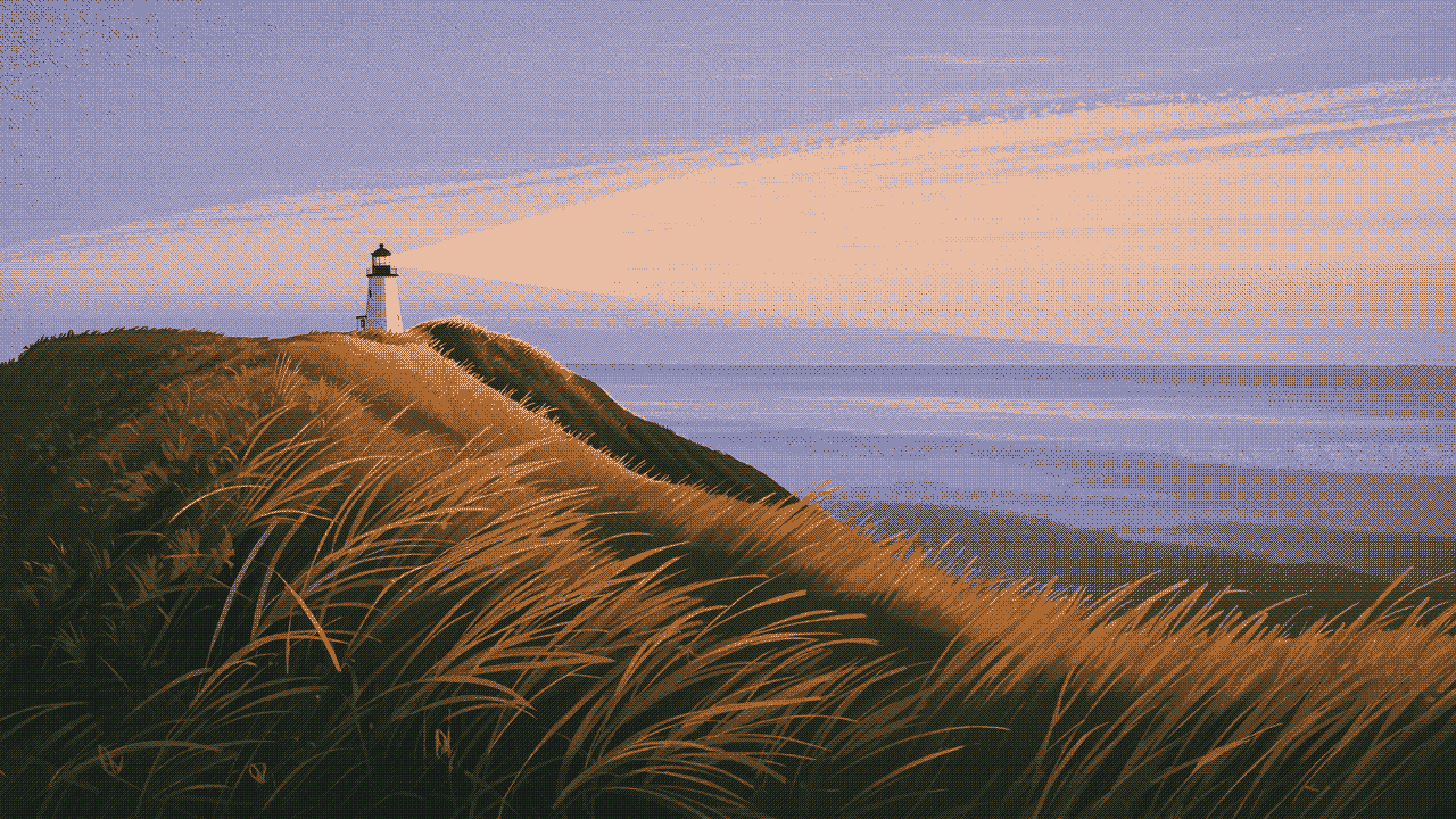 A lighthouse on a grassy headland at dusk